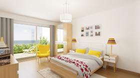 Apartment im Gartengeschoss mit Panoramablick auf das Meer und den Himmel